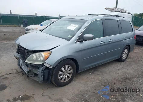2010 Honda Odyssey Ex-L z USA, uszkodzony, nr VIN 5FNRL3H75AB057282